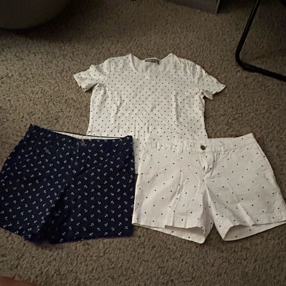 Two pairs of navy blue and white shorts size 6 with a polka dot shirt